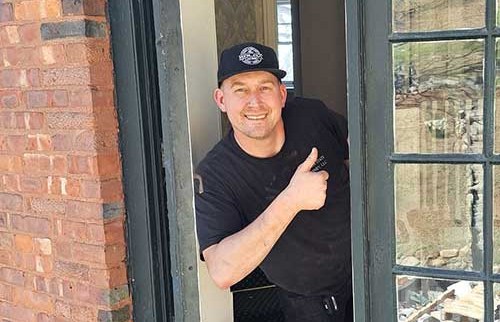 Garden State Chimney technician giving a thumbs up