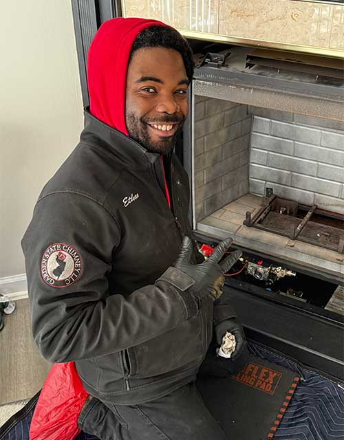 Technician repairing a fireplace