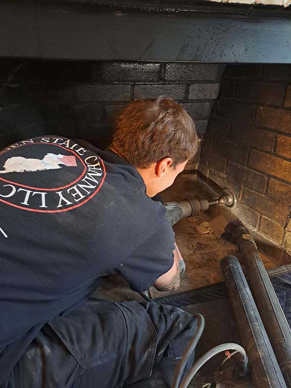 Technician fixing Fireplace